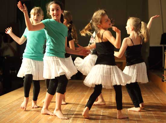 Dancers from Joyful Movement Kids perform a dance derived from three cultures: the Middle East, Latin America, and Africa. 